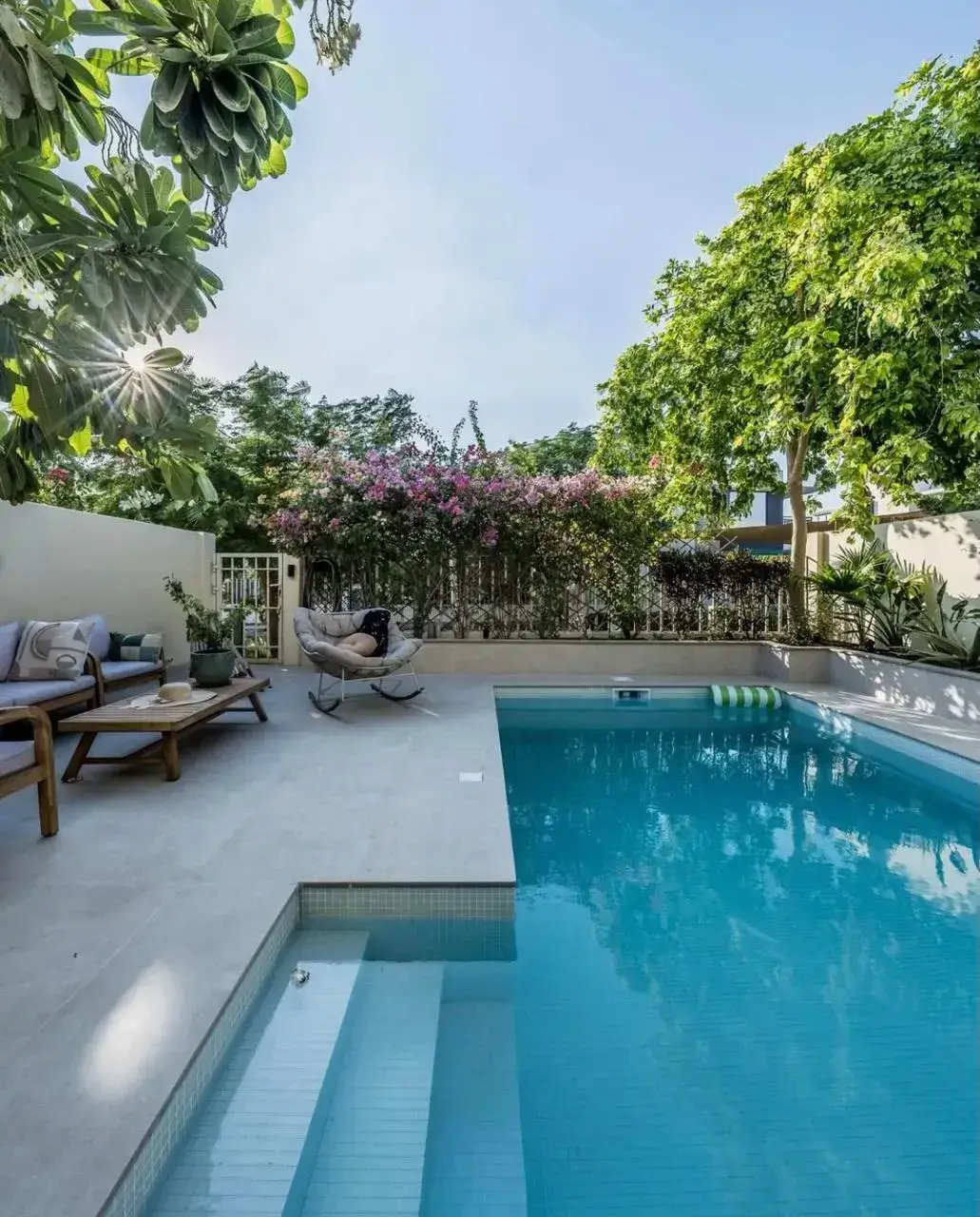 Luxury pool landscaping and maintenance in Dubai by Reshape Landscaping and Design, a British-owned company specialising in modern outdoor design, pool care, and garden maintenance.